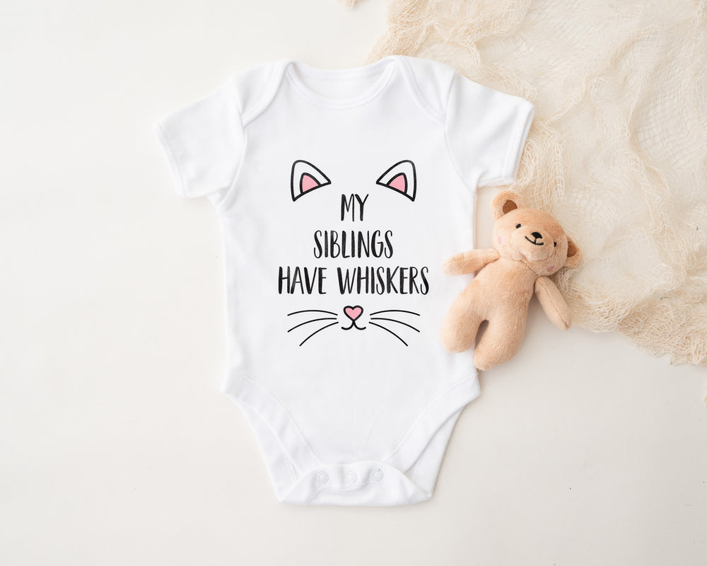 My Siblings Have Whiskers” Sleepsuit – Funny Animal Lover Baby Bodysuit or Bib – Cute Baby Clothes for Pet-Loving Families
